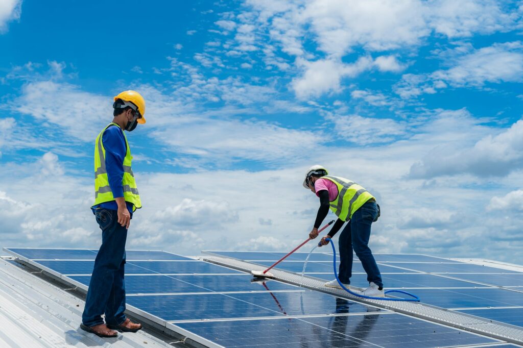 Solar roof cleaning, Professional technicians were washing and the surface of the solar panels